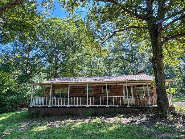 2 Acres of Land with Home for Sale in Atlanta, Texas