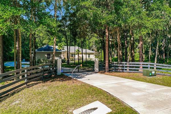 6.83 Acres of Land with Home for Sale in Oxford, Florida