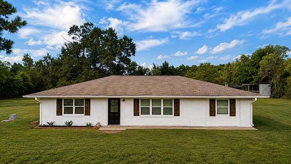 1.5 Acres of Land with Home for Sale in Buna, Texas