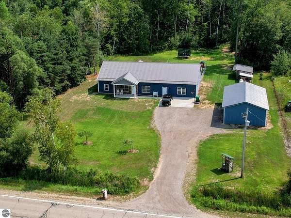 15.8 Acres of Recreational Land with Home for Sale in Shepherd, Michigan