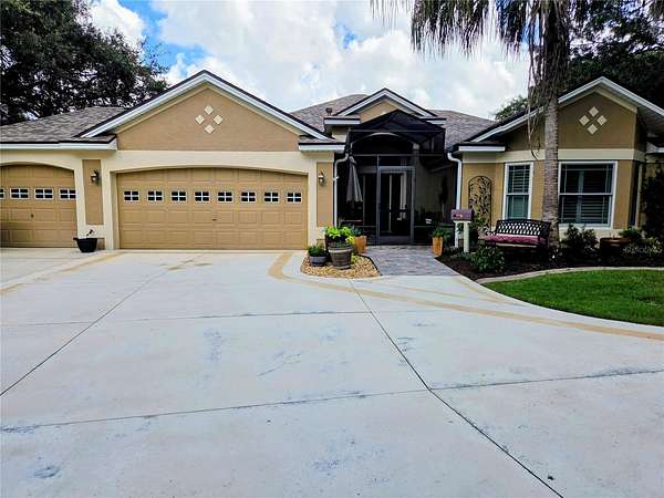 1.5 Acres of Land with Home for Sale in Lady Lake, Florida