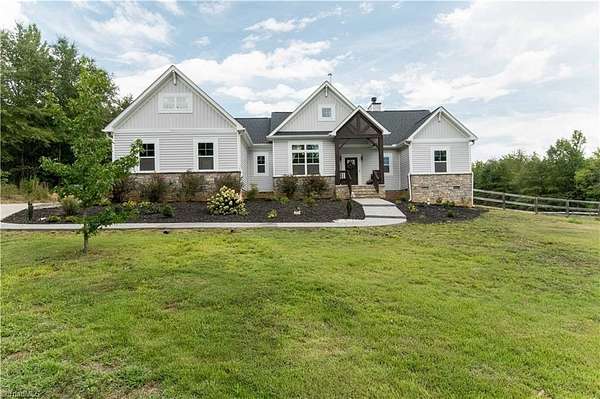 10.4 Acres of Land with Home for Sale in Walnut Cove, North Carolina