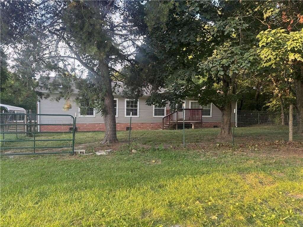 2.34 Acres of Land with Home for Sale in Excelsior Springs, Missouri