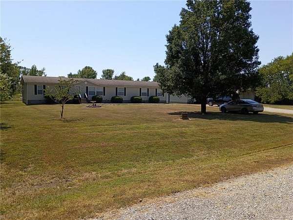 2.6 Acres of Land with Home for Sale in Girard, Kansas