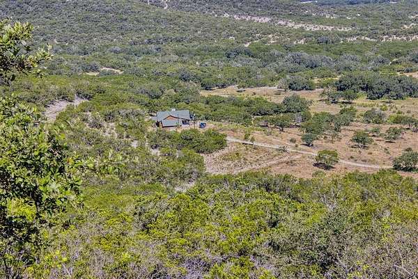132 Acres of Land with Home for Sale in Bandera, Texas