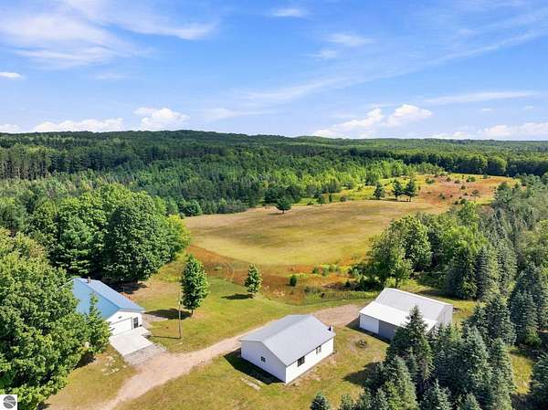 85.9 Acres of Recreational Land with Home for Sale in Cadillac, Michigan