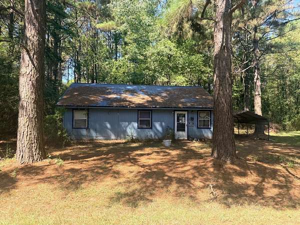 8.76 Acres of Land with Home for Sale in Wilton, Arkansas
