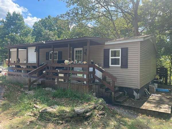 7.38 Acres of Land with Home for Sale in Shelbyville, Tennessee