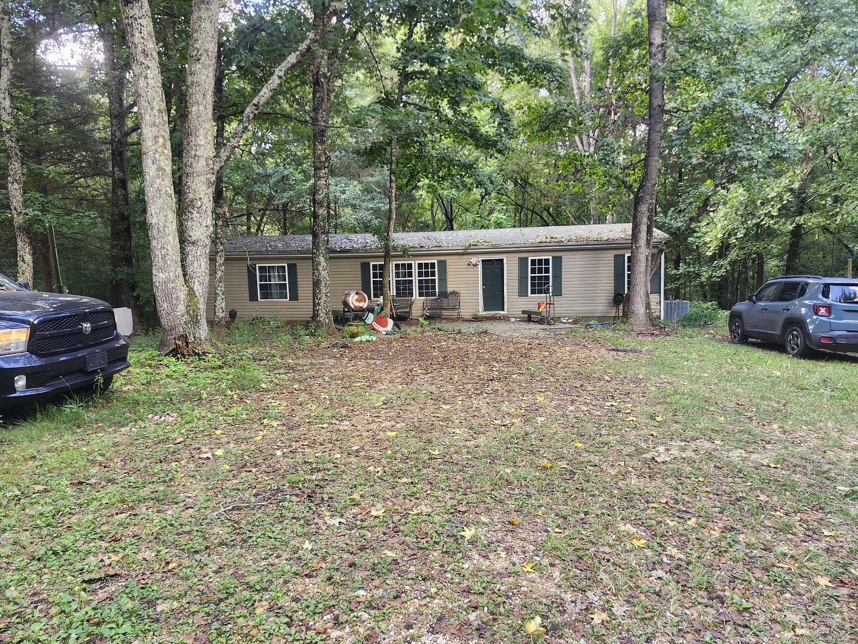 10.2 Acres of Land with Home for Sale in Puryear, Tennessee