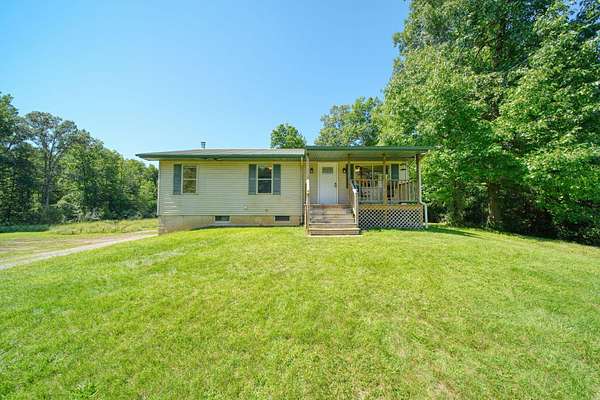 6 Acres of Land with Home for Sale in Addison, Michigan