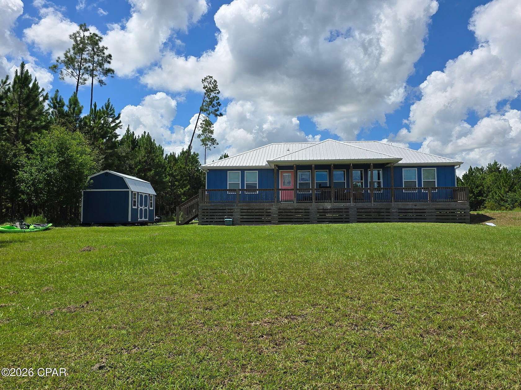 1.64 Acres of Land with Home for Sale in Wewahitchka, Florida