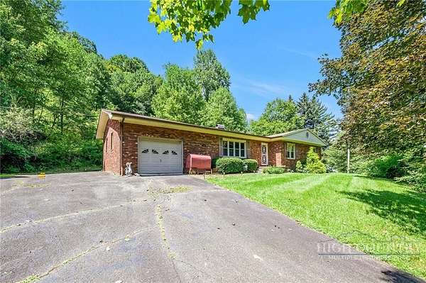 22 Acres of Land with Home for Sale in Lansing, North Carolina