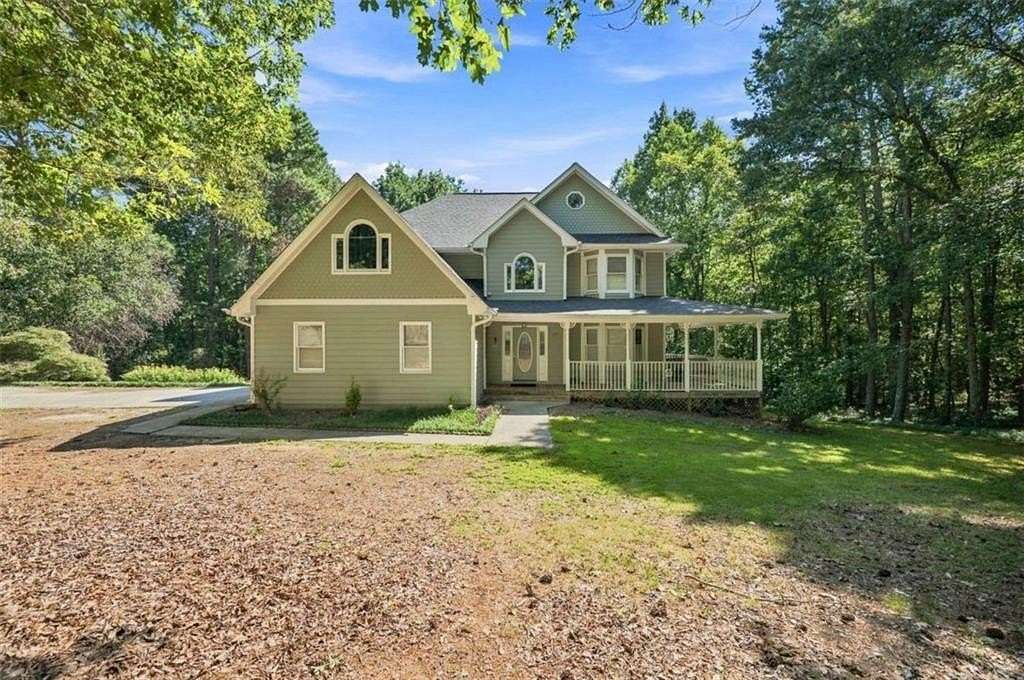 6.66 Acres of Land with Home for Sale in Auburn, Georgia