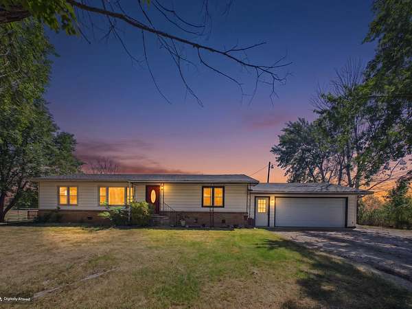 10 Acres of Land with Home for Sale in Louisburg, Missouri
