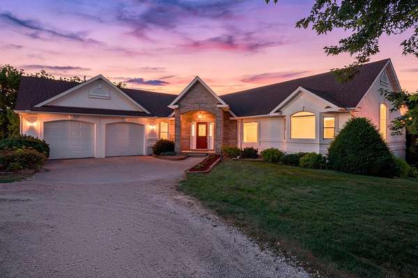 23.4 Acres of Land with Home for Sale in River Falls, Wisconsin