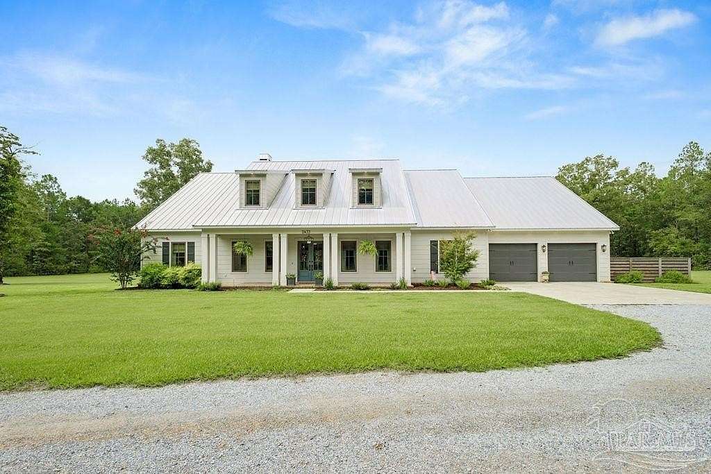 19.3 Acres of Land with Home for Sale in Pace, Florida