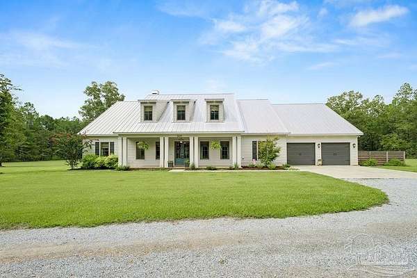 19.3 Acres of Land with Home for Sale in Pace, Florida