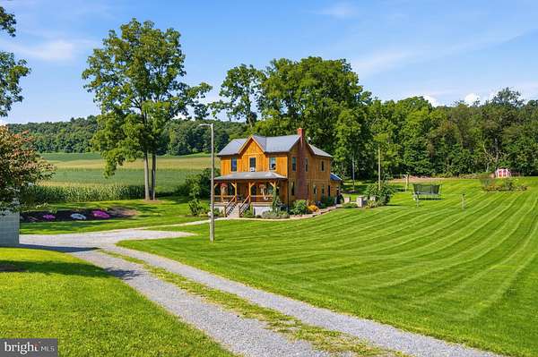 9.57 Acres of Land with Home for Auction in Williamsburg, Pennsylvania