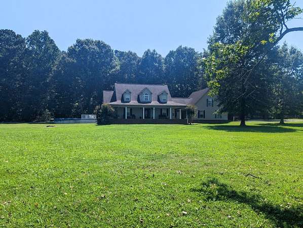 4.86 Acres of Land with Home for Sale in Arab, Alabama