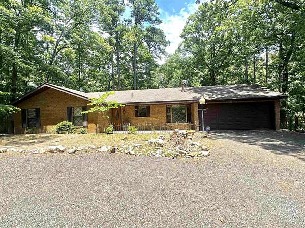 6.27 Acres of Land with Home for Sale in Mena, Arkansas