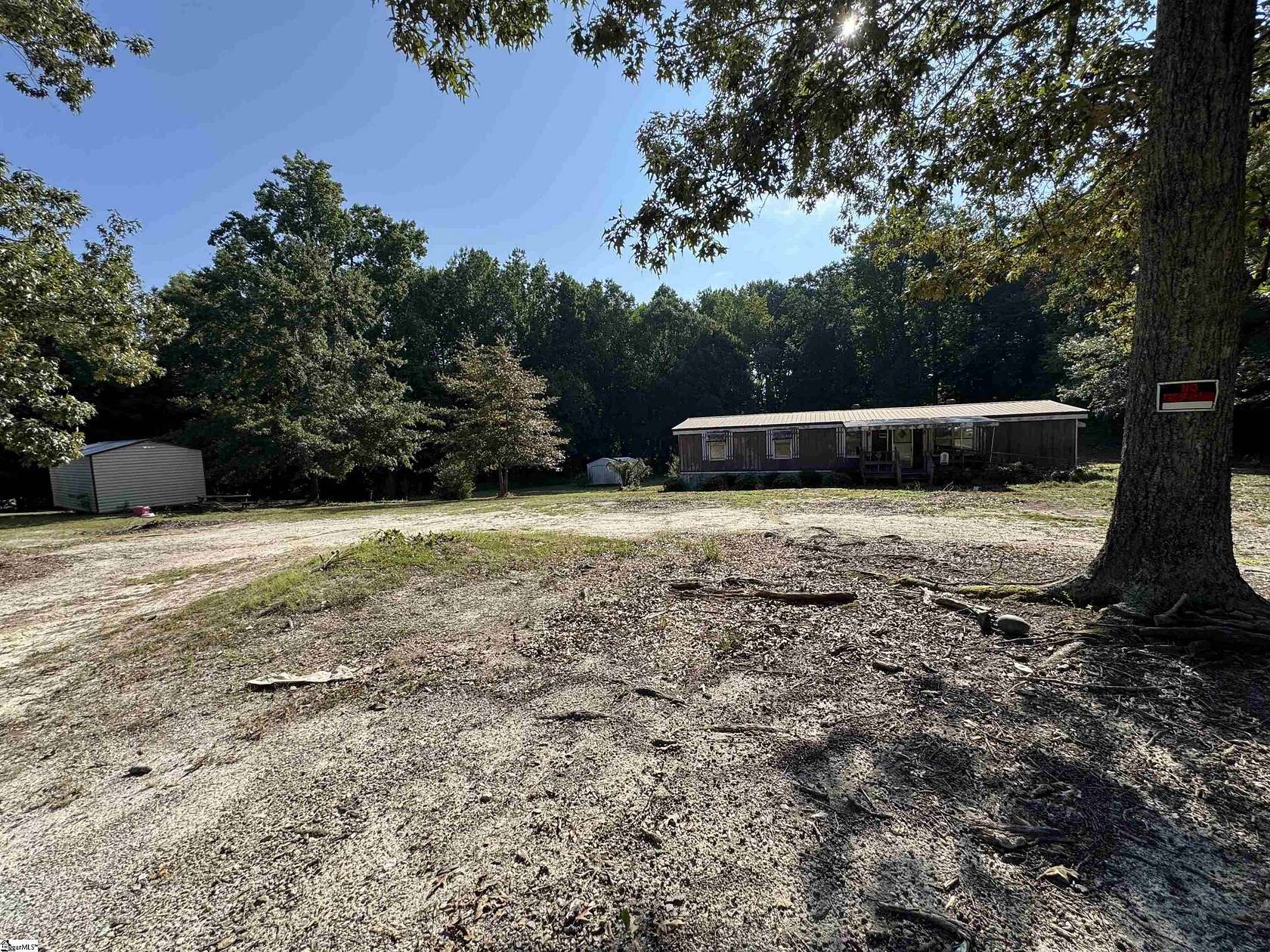 3.47 Acres of Land with Home for Sale in Gray Court, South Carolina