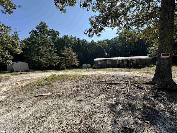 3.47 Acres of Land with Home for Sale in Gray Court, South Carolina