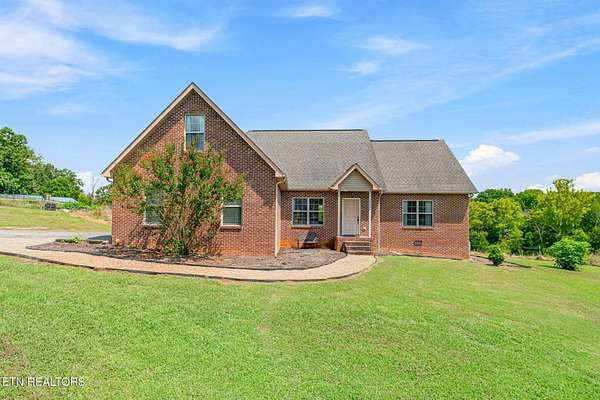 12.3 Acres of Land with Home for Sale in Kodak, Tennessee