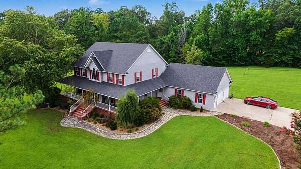 82.6 Acres of Recreational Land with Home for Sale in Springville, Tennessee