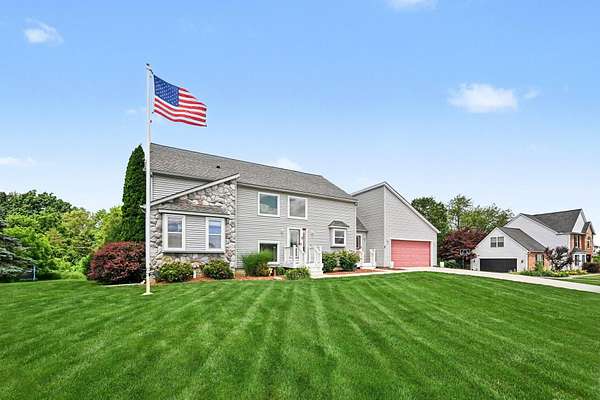 1.5 Acres of Land with Home for Sale in Whitmore Lake, Michigan
