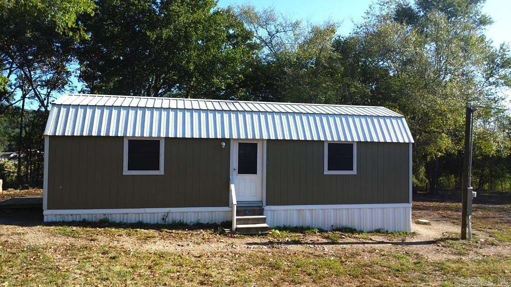1.15 Acres of Land with Home for Sale in Sims, Arkansas