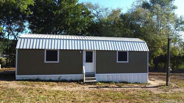 1.15 Acres of Land with Home for Sale in Sims, Arkansas