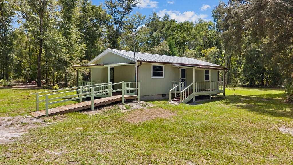 4.67 Acres of Land with Home for Sale in Old Town, Florida