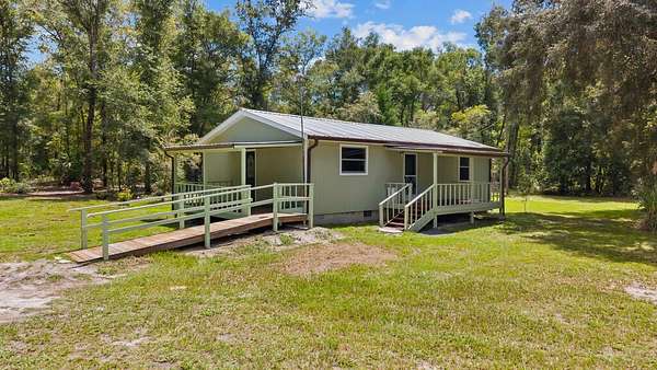 4.67 Acres of Land with Home for Sale in Old Town, Florida