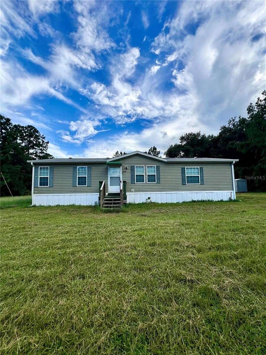 1.56 Acres of Land with Home for Sale in Palatka, Florida