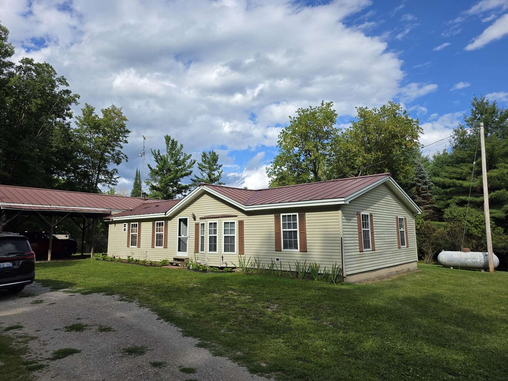 40 Acres of Recreational Land with Home for Sale in Glennie, Michigan