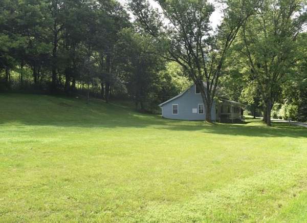 6.73 Acres of Land with Home for Sale in Pleasant Shade, Tennessee