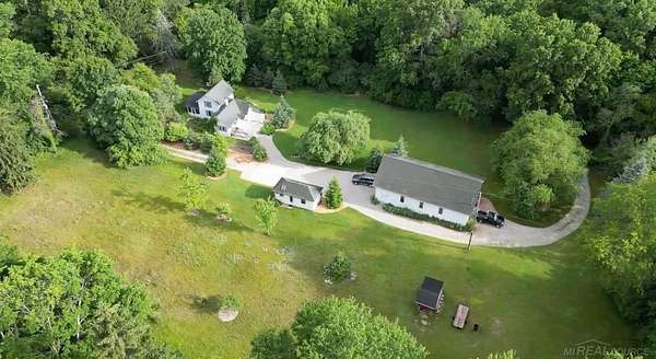 3.33 Acres of Land with Home for Sale in Ada, Michigan