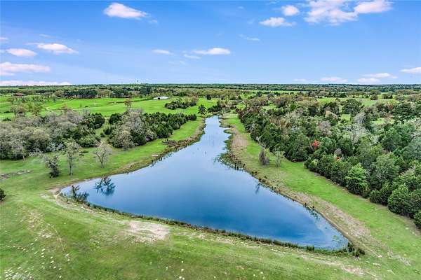 176 Acres of Land with Home for Sale in Paige, Texas