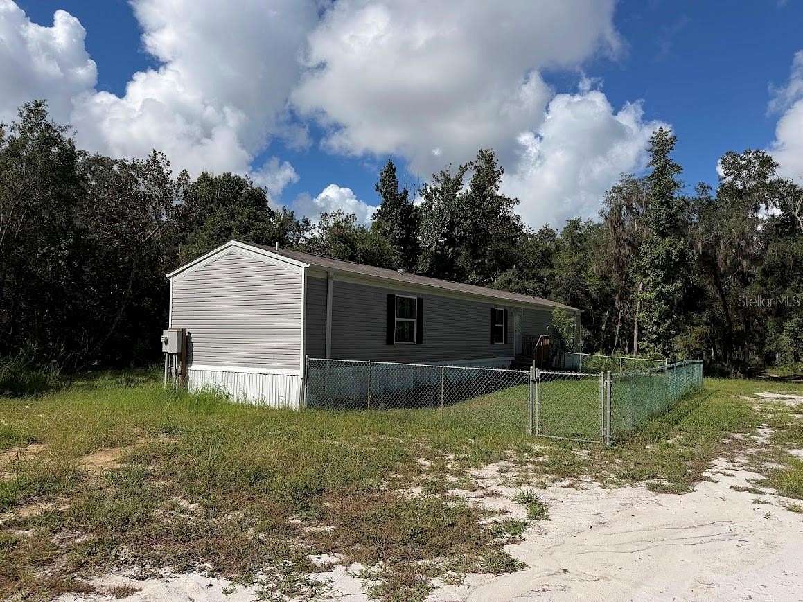 6.72 Acres of Land with Home for Lease in Citra, Florida
