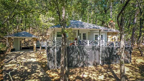 1.59 Acres of Land with Home for Sale in Fairfield Bay, Arkansas