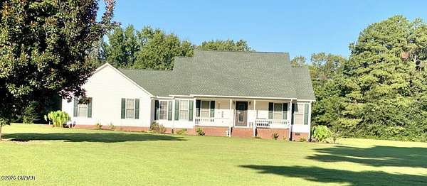 7.5 Acres of Land with Home for Sale in Milan, Tennessee