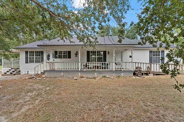 10.3 Acres of Land with Home for Sale in Tenaha, Texas