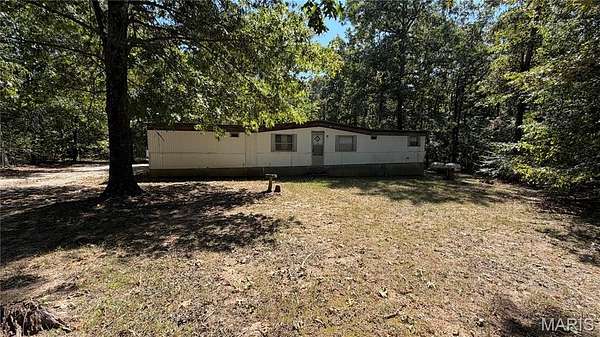 8.7 Acres of Land with Home for Sale in Doniphan, Missouri