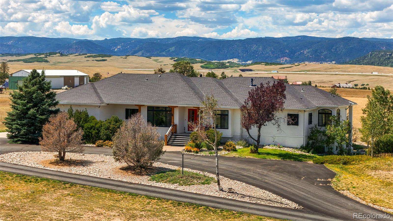 9.82 Acres of Land with Home for Sale in Larkspur, Colorado