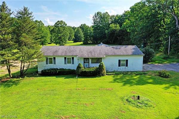 6.69 Acres of Land with Home for Sale in Berlin Center, Ohio