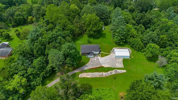 6.4 Acres of Land with Home for Sale in Bedford, Indiana