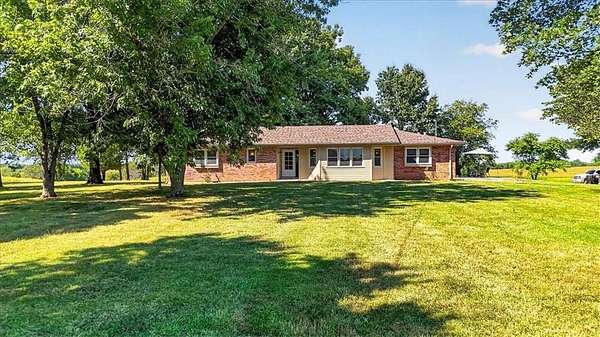 5 Acres of Land with Home for Sale in Garden City, Missouri