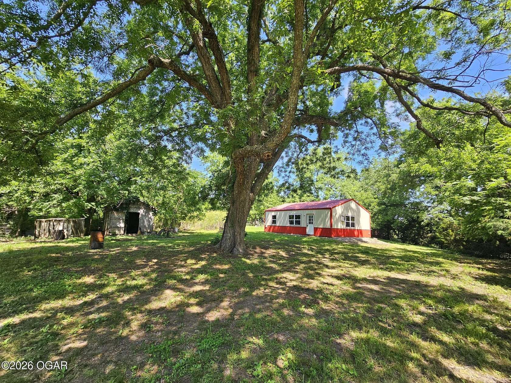 28 Acres of Land with Home for Sale in Powell, Missouri