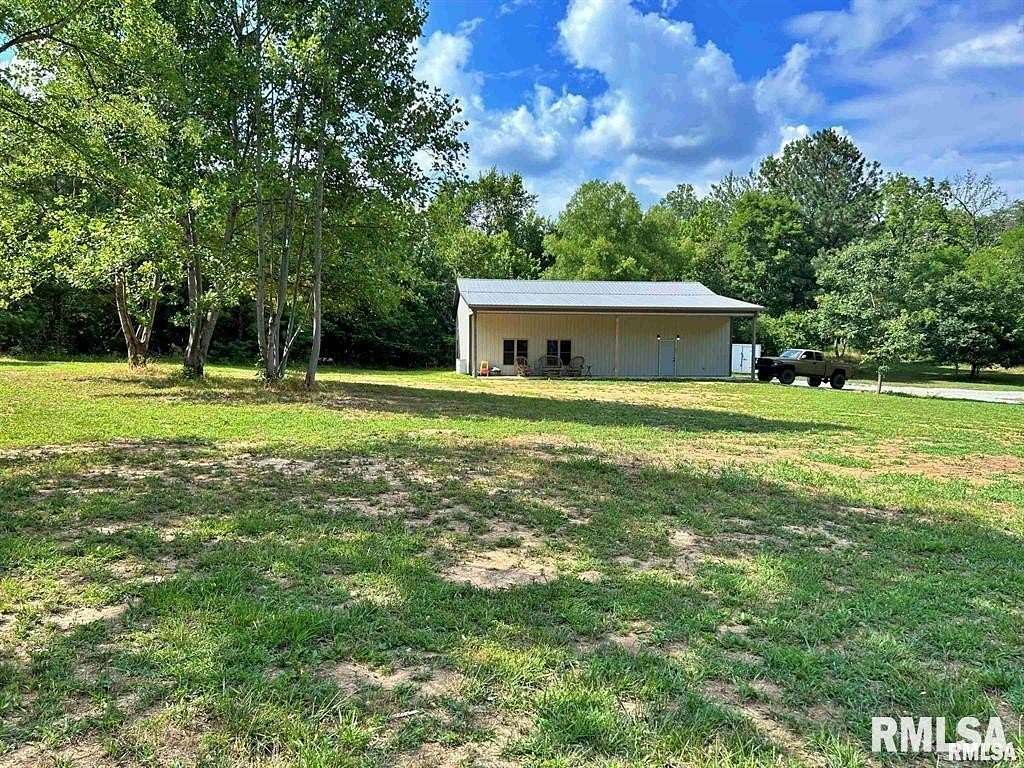 5.73 Acres of Land with Home for Sale in Golconda, Illinois