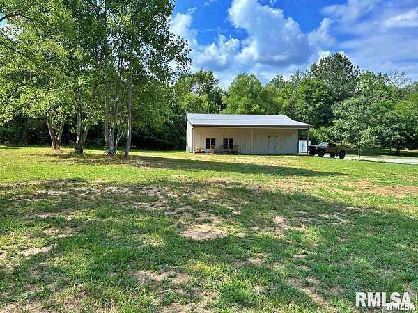 5.73 Acres of Land with Home for Sale in Golconda, Illinois